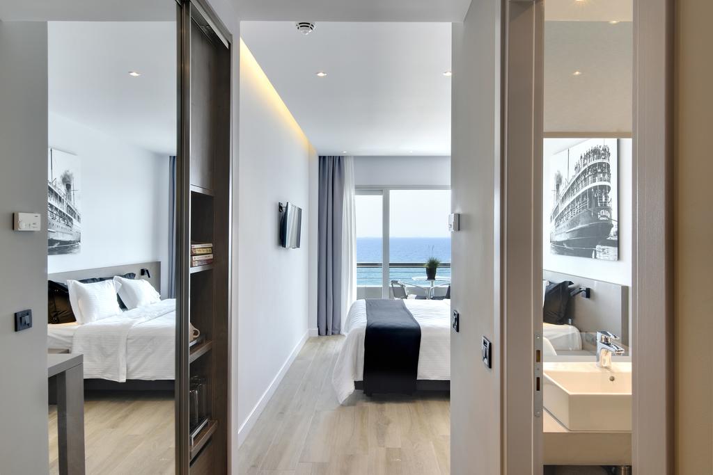 Hotel Athens Posedion family sea view room.jpg