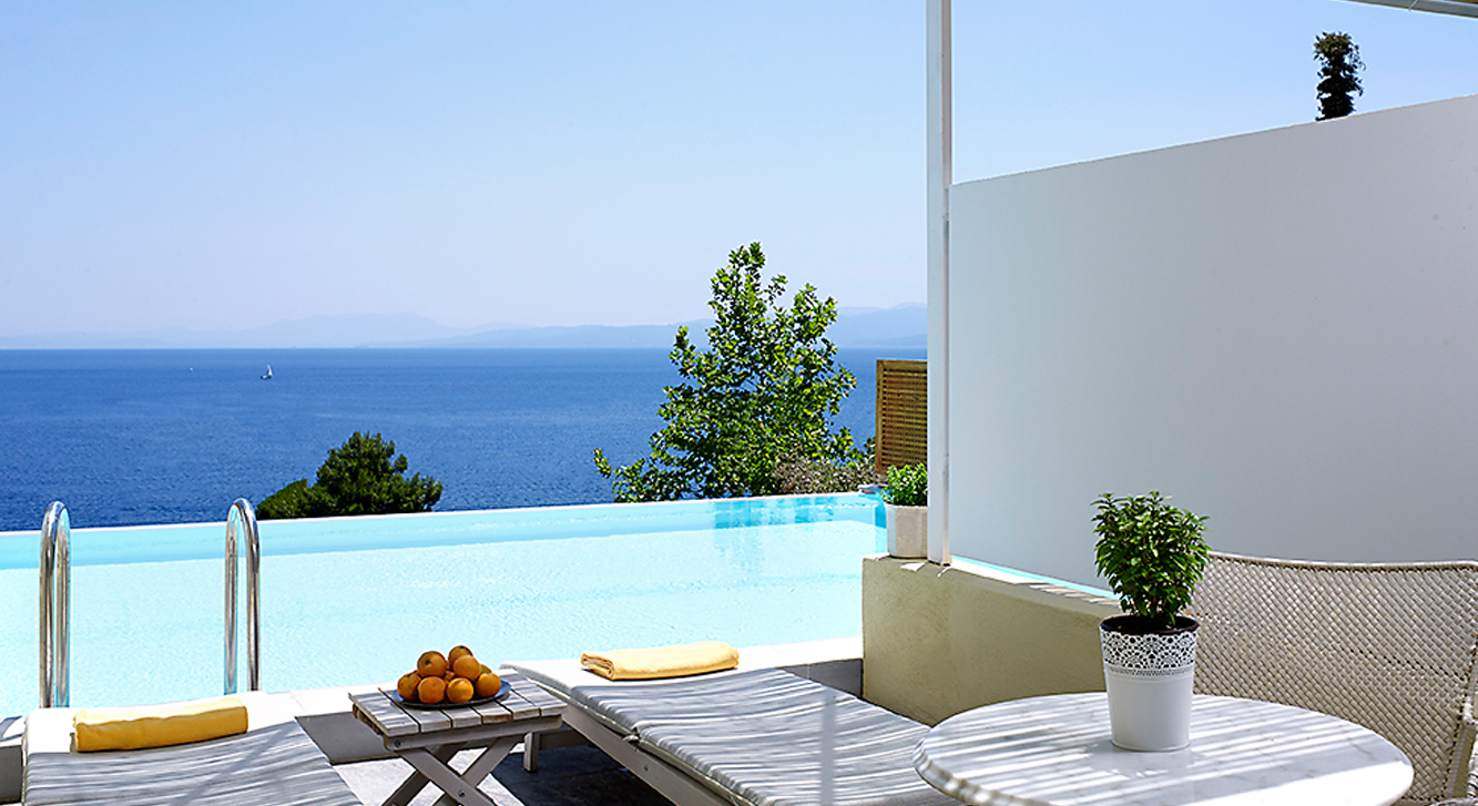 Hotel Atrium of Skiatos junior suite with infinity pool.jpg
