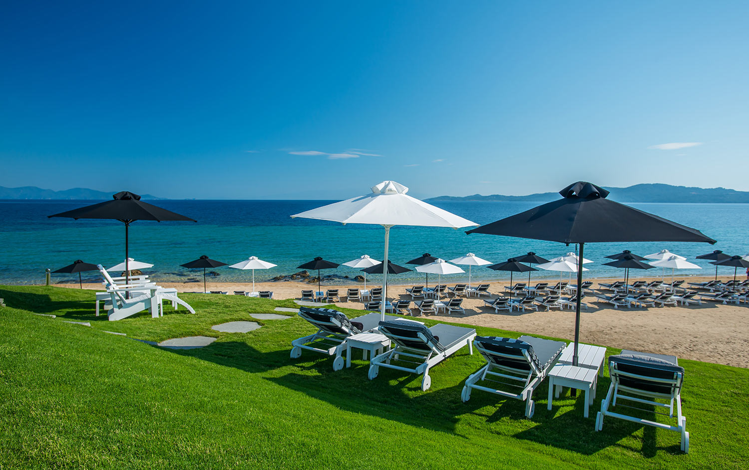Avaton Luxury Villas Resort - Relais _ Chateaux beach.jpg