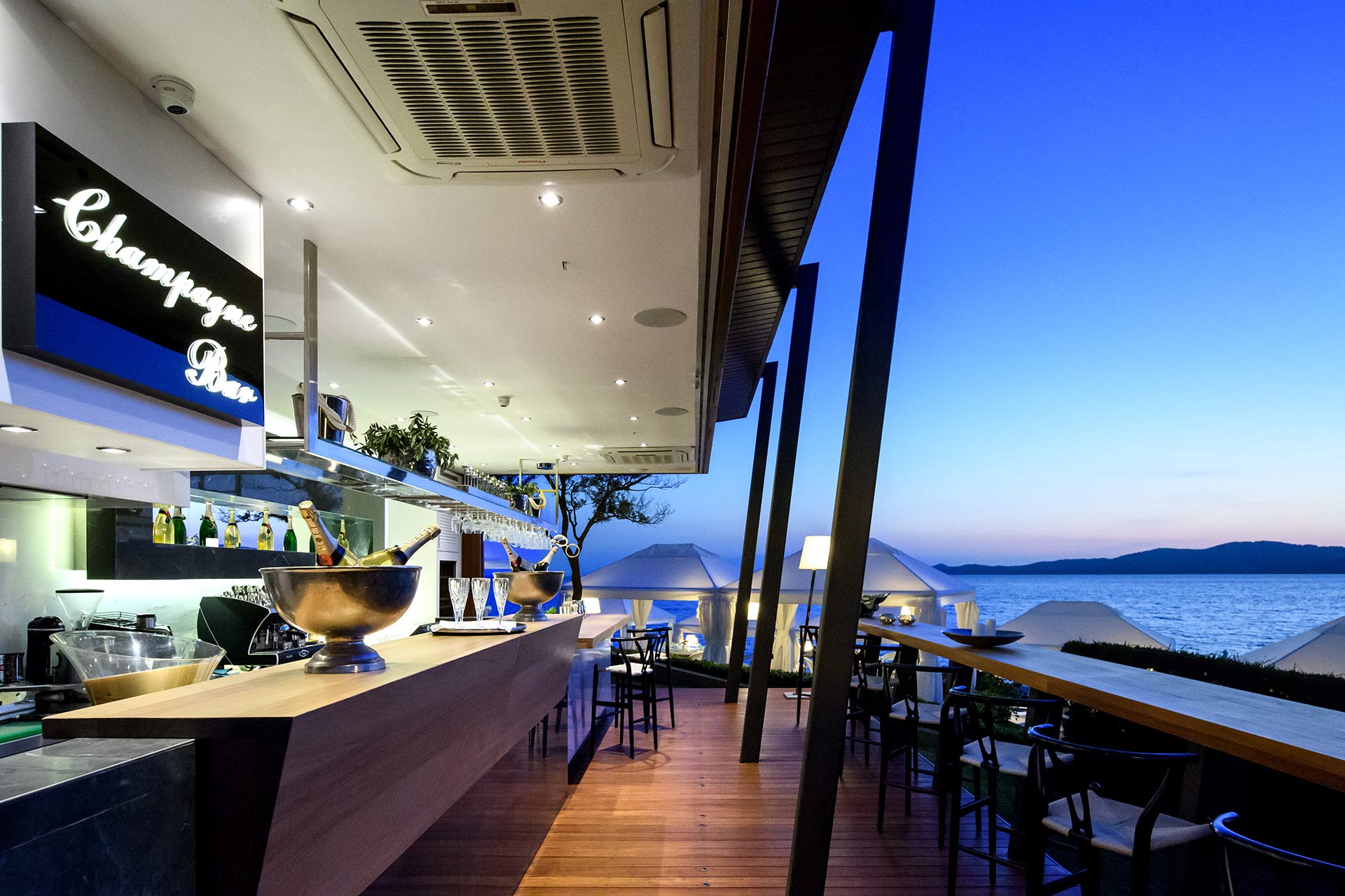 Avaton Luxury Villas Resort - Relais _ Chateaux champagne bar.jpg