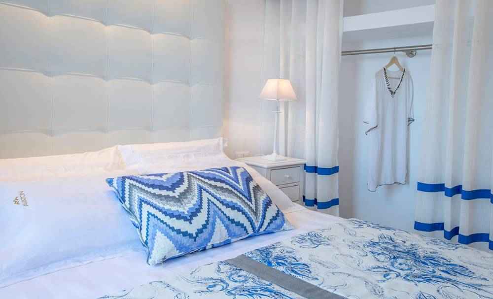 Avaton Luxury Villas Resort - Relais _ Chateaux deluxe room with sea view.jpg
