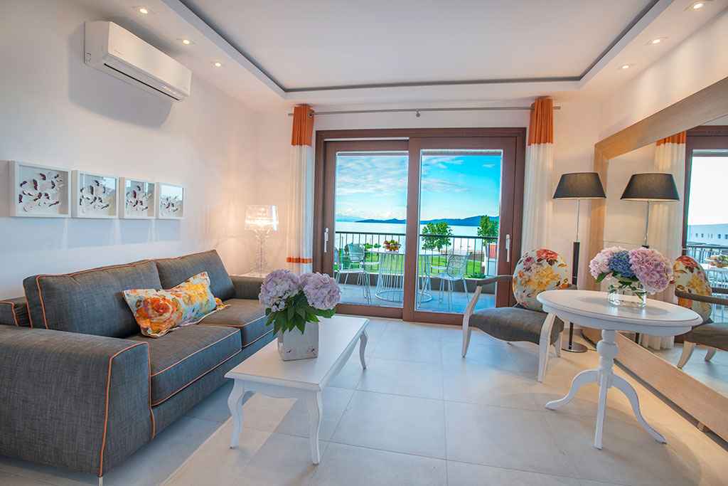 Avaton Luxury Villas Resort - Relais _ Chateaux one bedroom suite with sea view.jpg