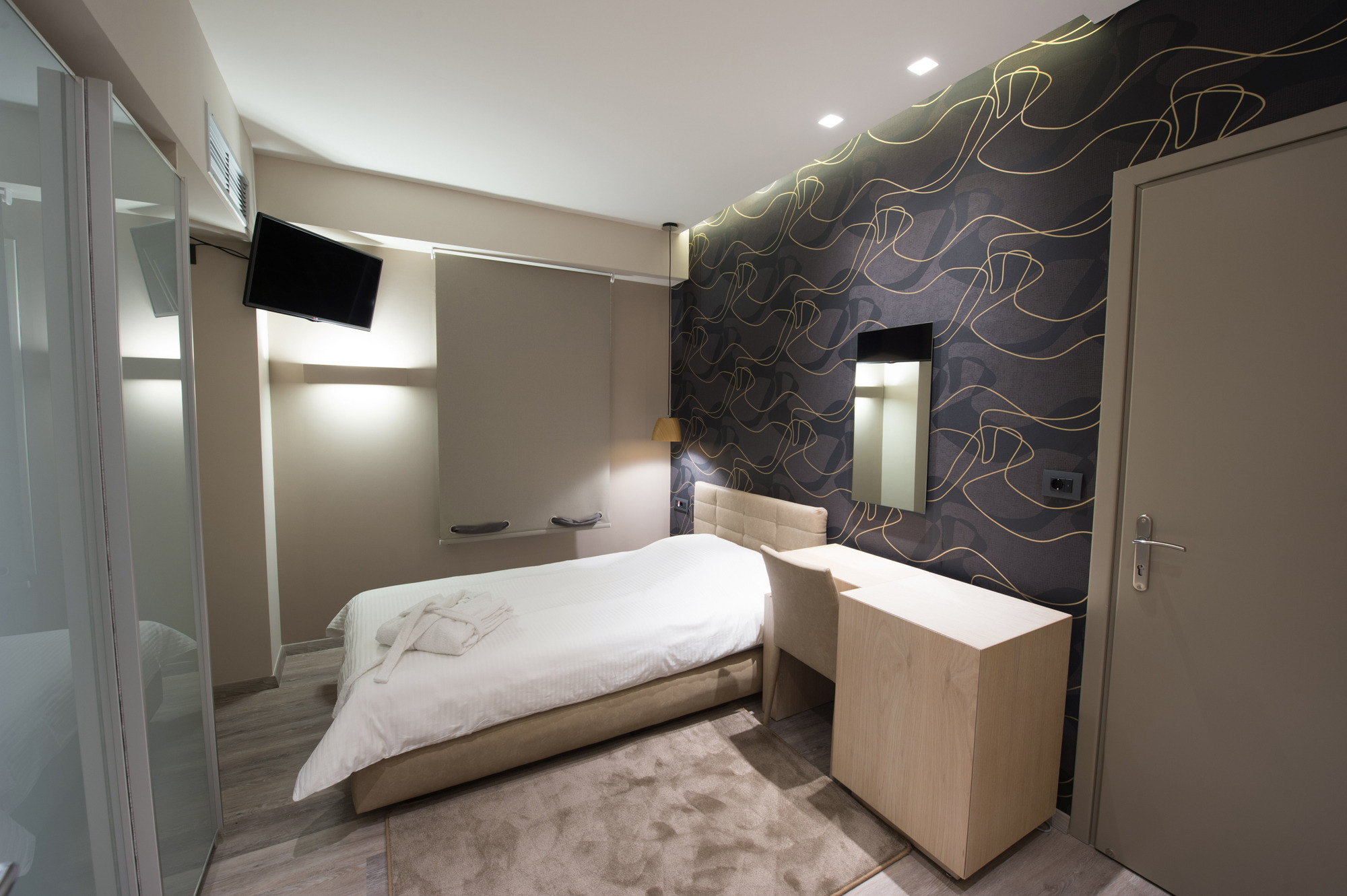 Hotel Castello City single room.jpg