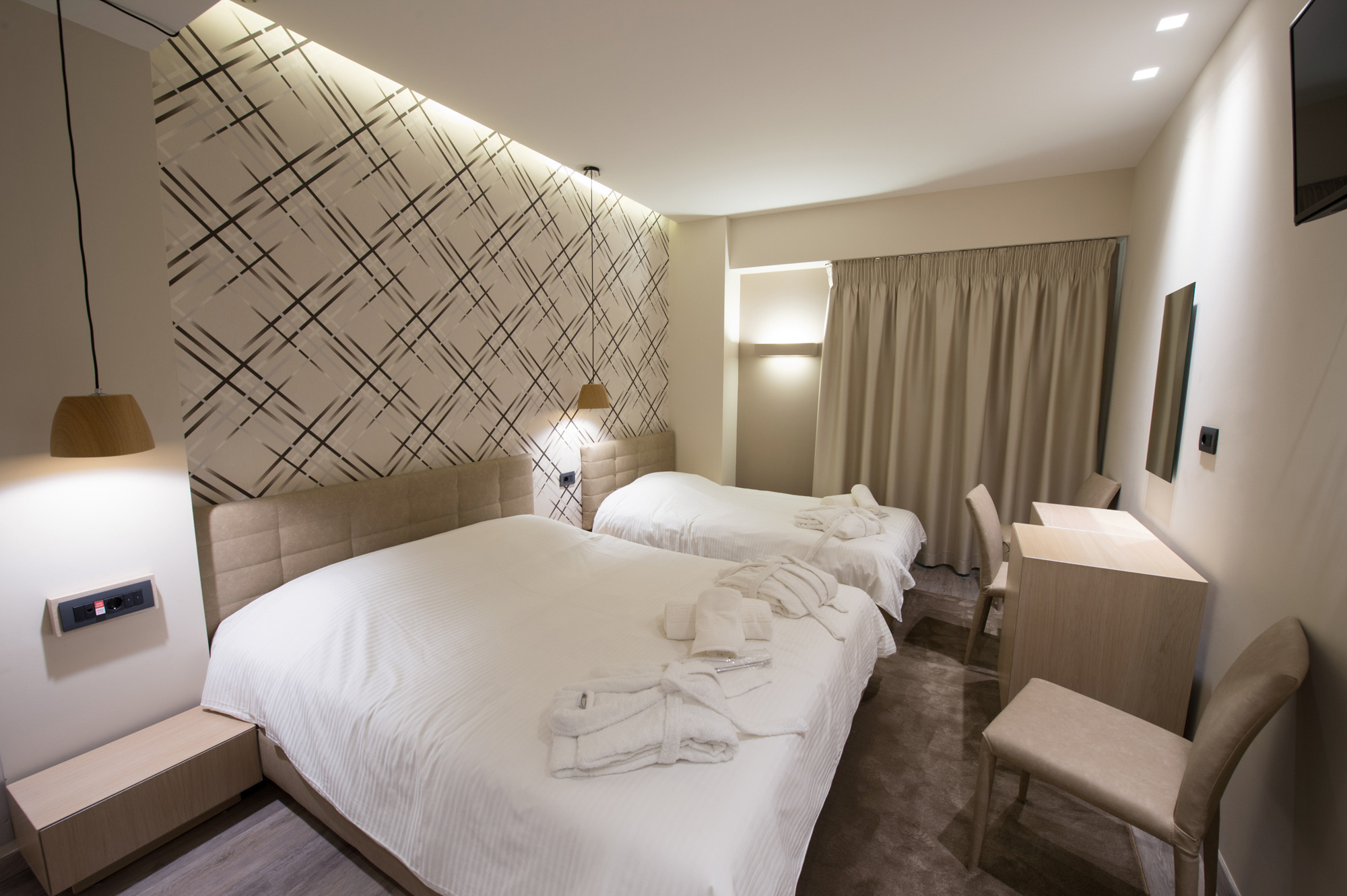 Hotel Castello City triple room.jpg
