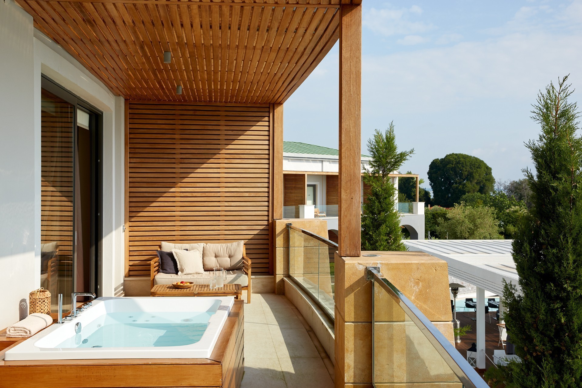 Hotel Cavo Olympo Luxury Resort _ Spa deluxe suite hot tub 1.jpeg