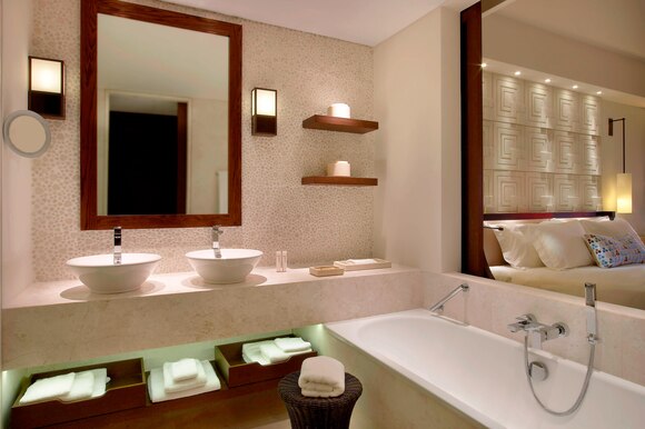 Hotel Costa Navarino Romanos deluxe room bathroom.jpg