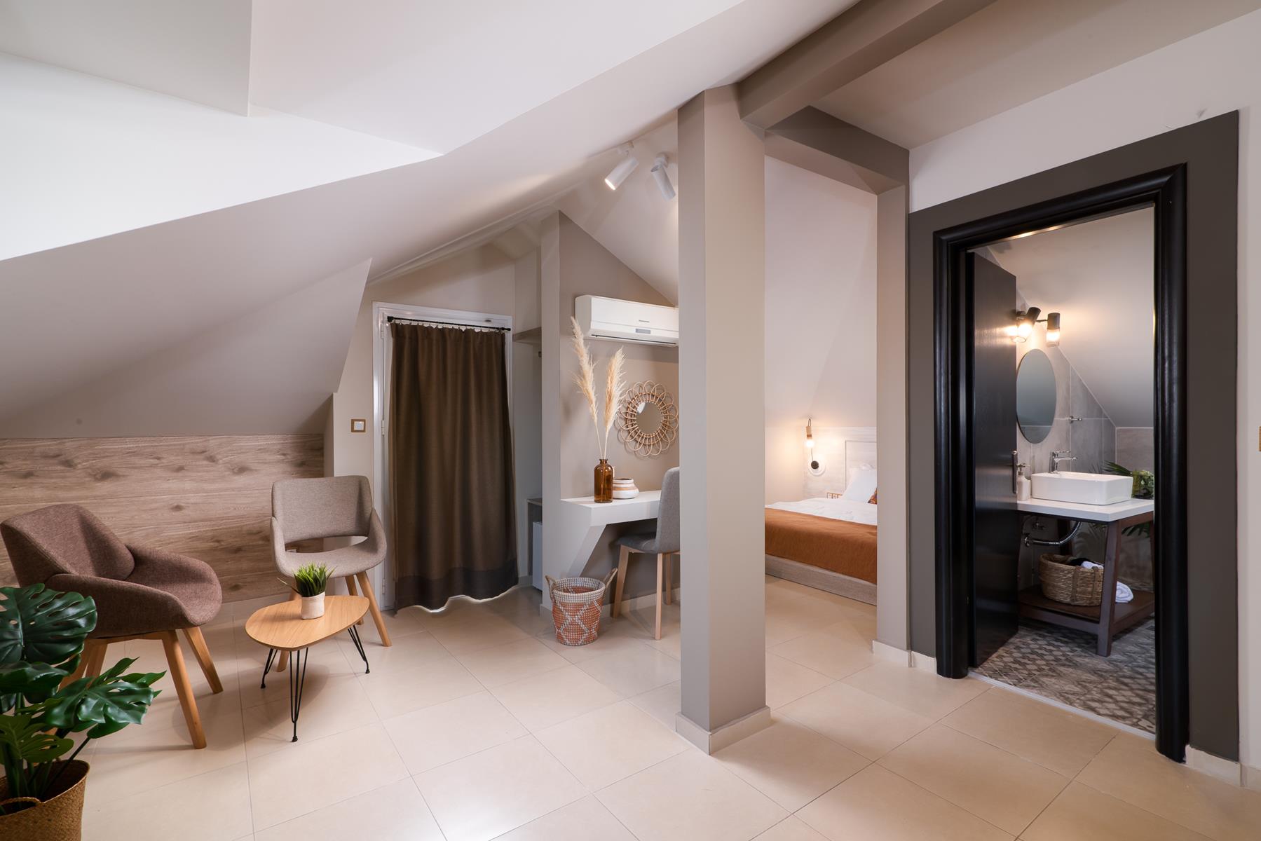 Elle Rooms & Suites-Delux suite attic.jpg