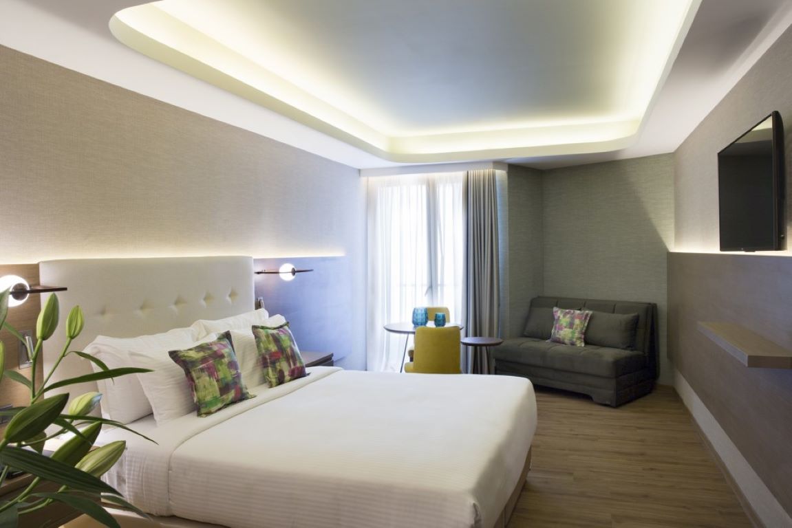 Wyndham Athens Residence hotel junior suite atrium view.jpg