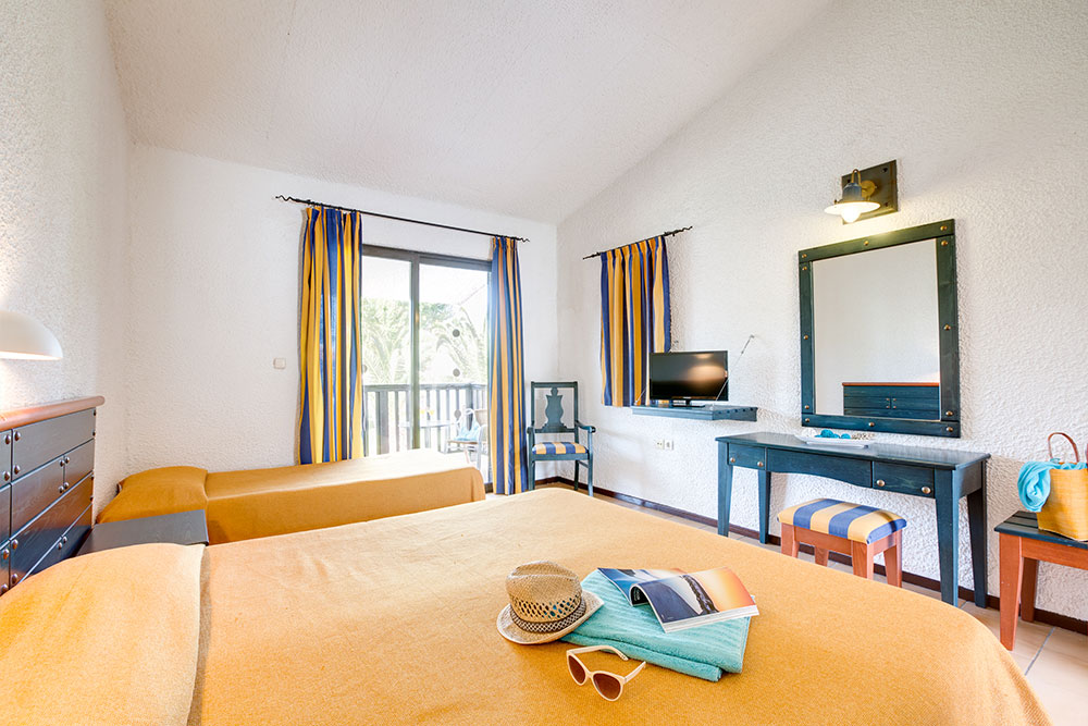 Hotel Golden Coast bungalow triple room.jpg