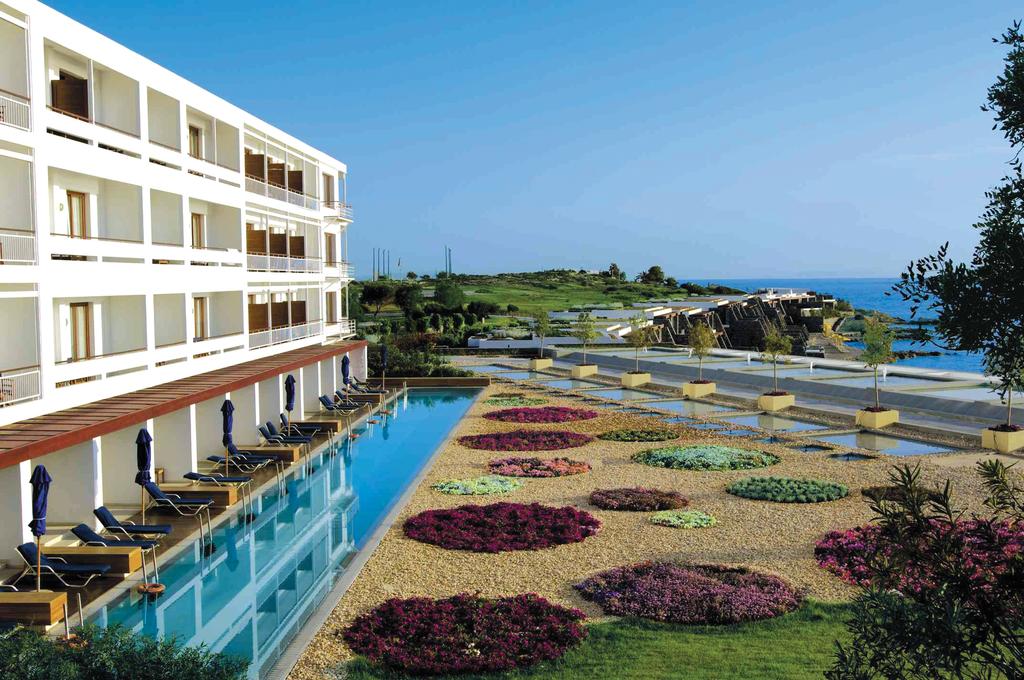 Hotel Grand Resort Lagonissi sunset superior room sharing pool 1.jpg