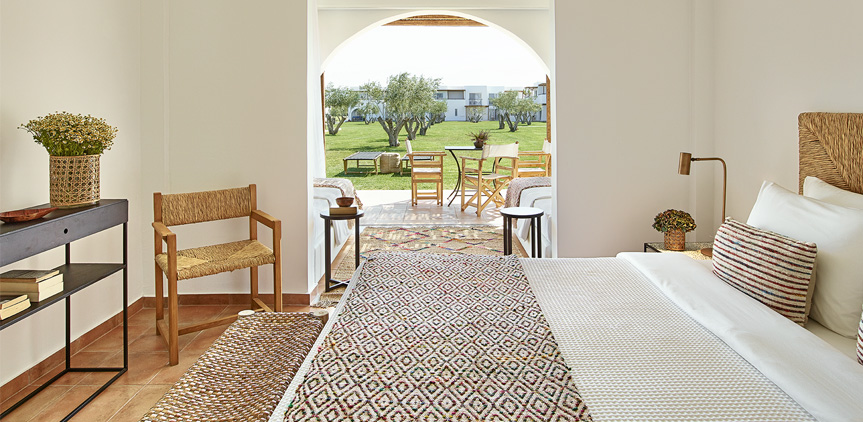 Hotel Grecotel Casa Marron Junior family bungalow with shaded patio.jpg