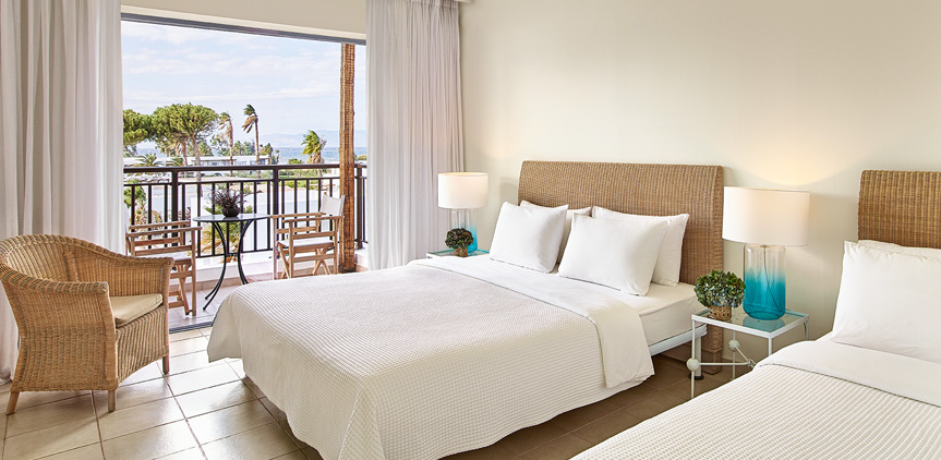 Hotel Grecotel Casa Marron Marron room sea side view.jpg