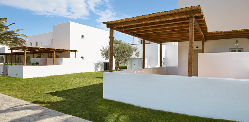 Hotel Grecotel Casa Marron Oliva bungalow with shaded patio 1.jpg