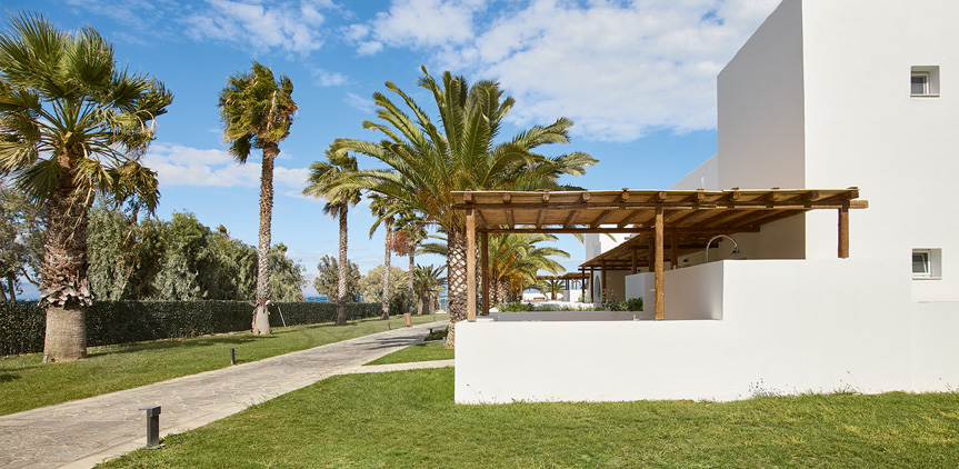 Hotel Grecotel Casa Marron Oliva bungalow with shaded patio.jpg