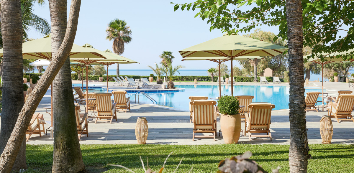 Hotel Grecotel Filoxenia Classic pool room with covered veranda.jpg