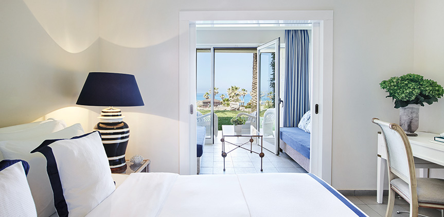 Hotel Grecotel La Riviera _ Aqua Park Junior Suite Covered Veranda _ Garden.jpg