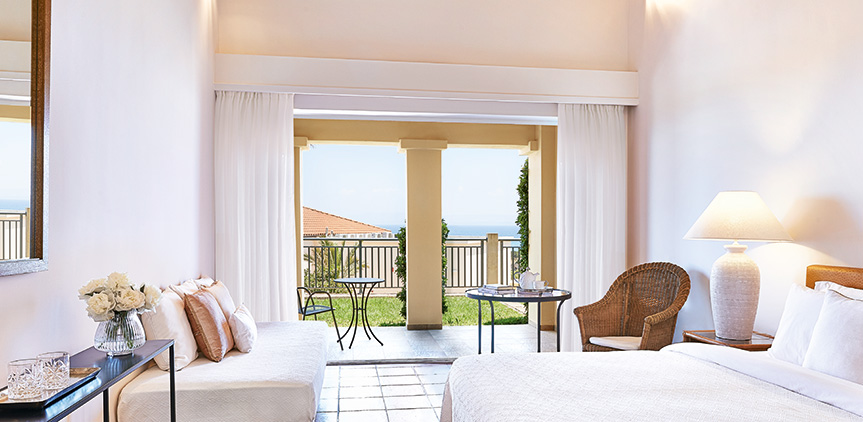 Hotel Grecotel Olympia Aqua Park Bungalow side sea view.jpg