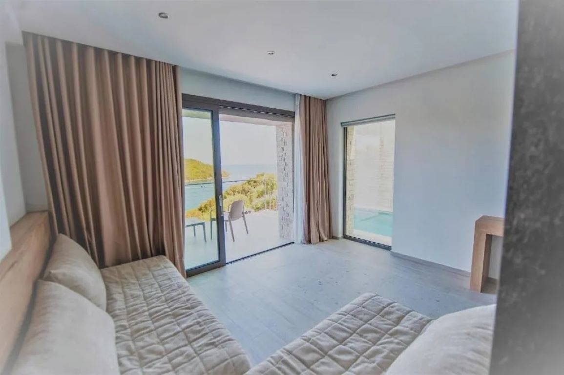 Sivota Deamaris Luxury Boutique Hotel-Junior suite privtni bazen dnevna soba.jpg