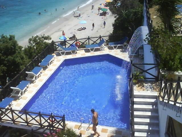 Hotel Karaoulanis Beach pool.jpg
