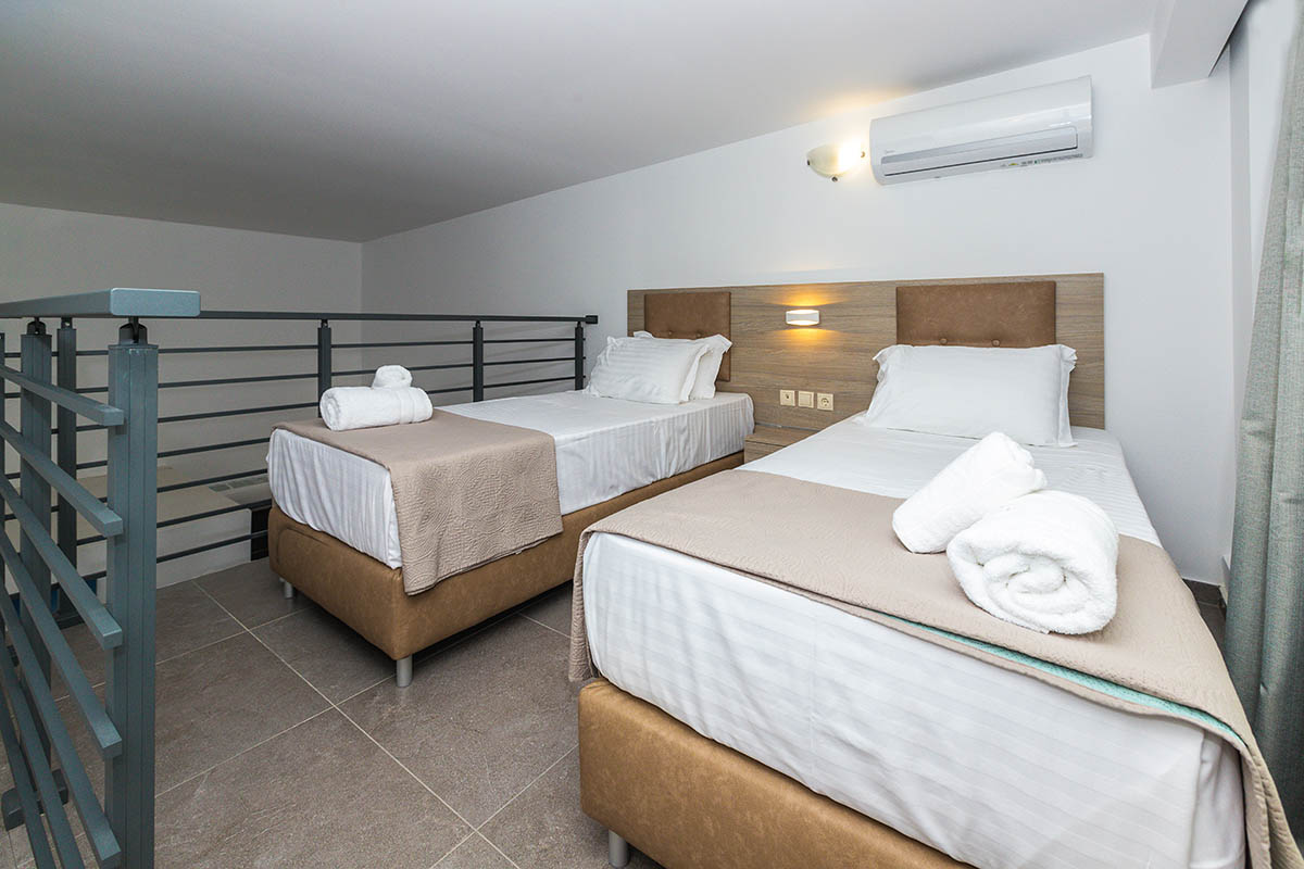 New Story Luxury Suites-Junior suite potkrovlje druga soba.jpg