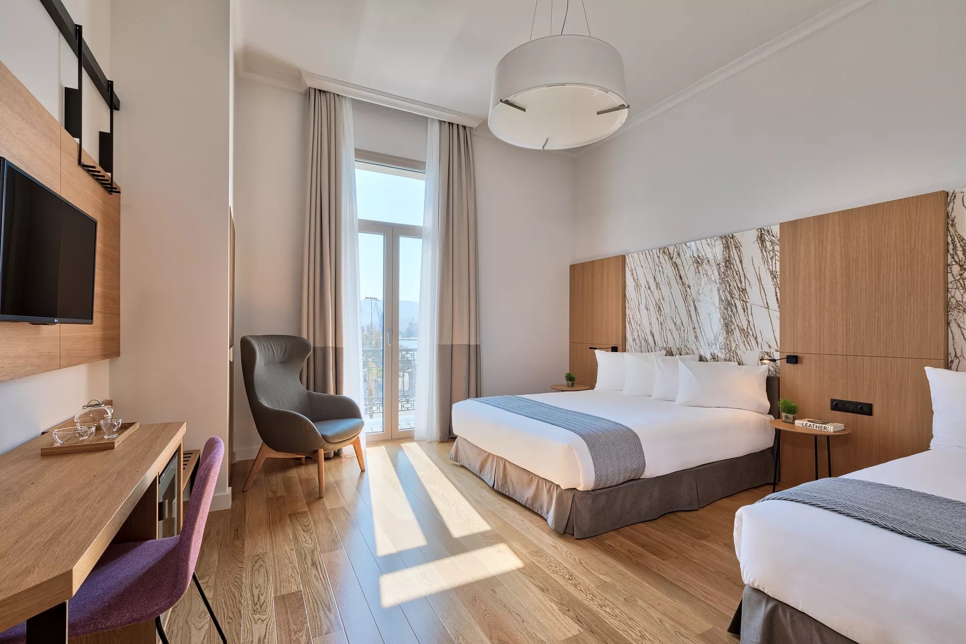 Aegli Hotel Volos-Deluxe trokrevetna soba.jpg