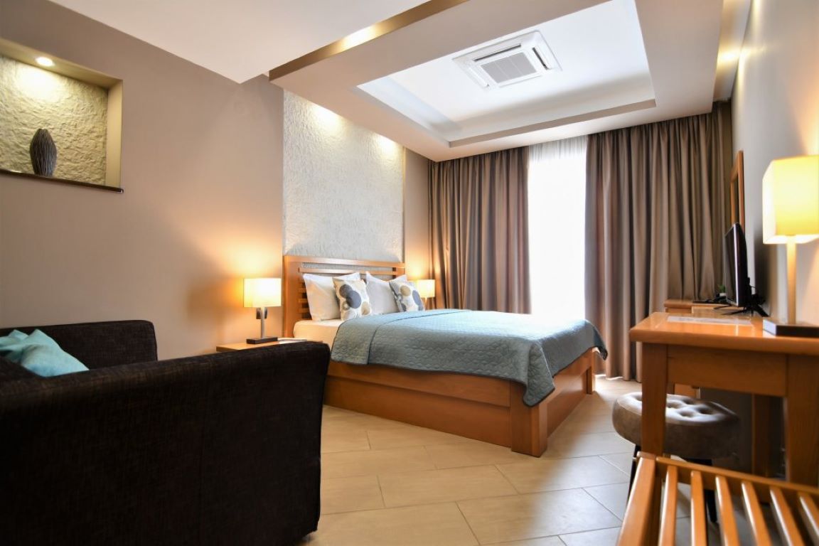 Hotel Perla-Deluxe trokrevetna soba.jpg