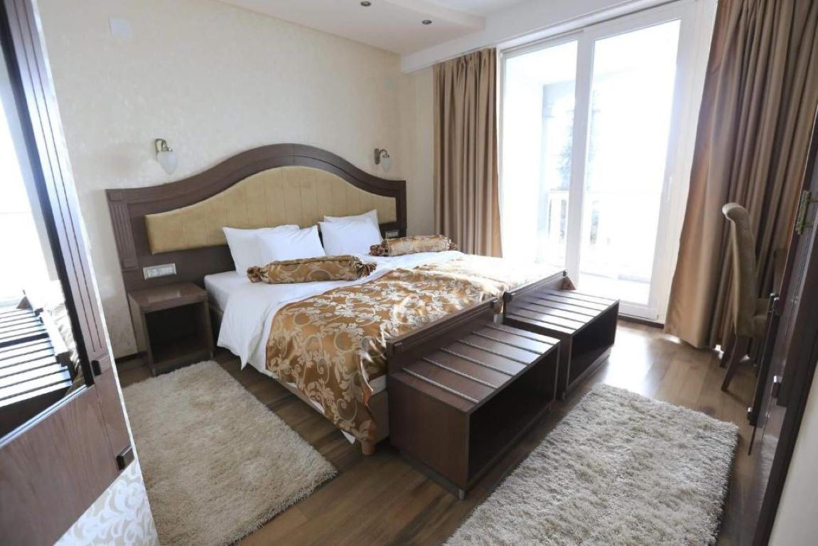 City Palace Hotel-Standardna soba odvojeni lezaji.jpg
