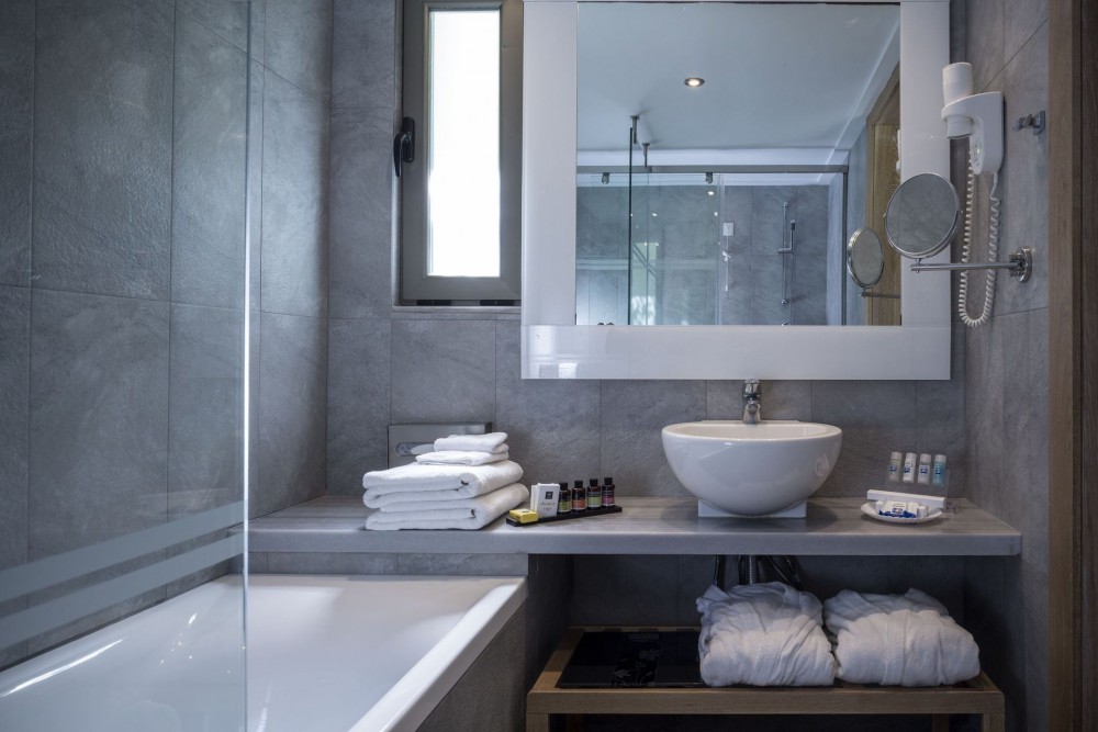 Kontokali Bay Resort _ Spa Hotel Bungalow room Sea Front bathroom.jpeg
