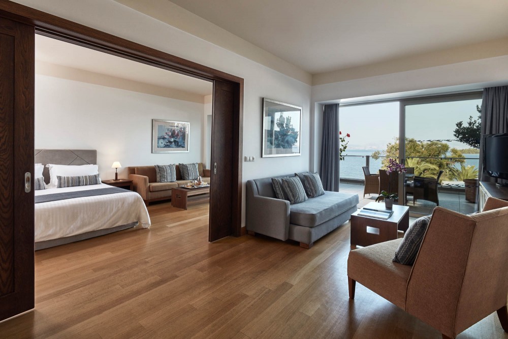 Kontokali Bay Resort _ Spa Hotel Deluxe Suite One Bedroom SV Main Building.jpg
