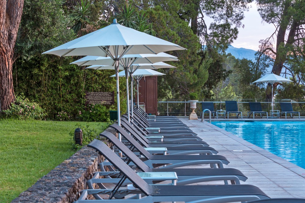 Kontokali Bay Resort _ Spa Sunbeds by the pool.jpg