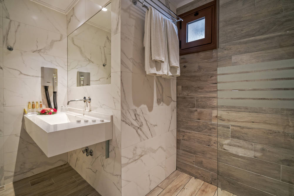 Lagomandra Beach_Suites Hotel Deluxe room Bathroom.jpg