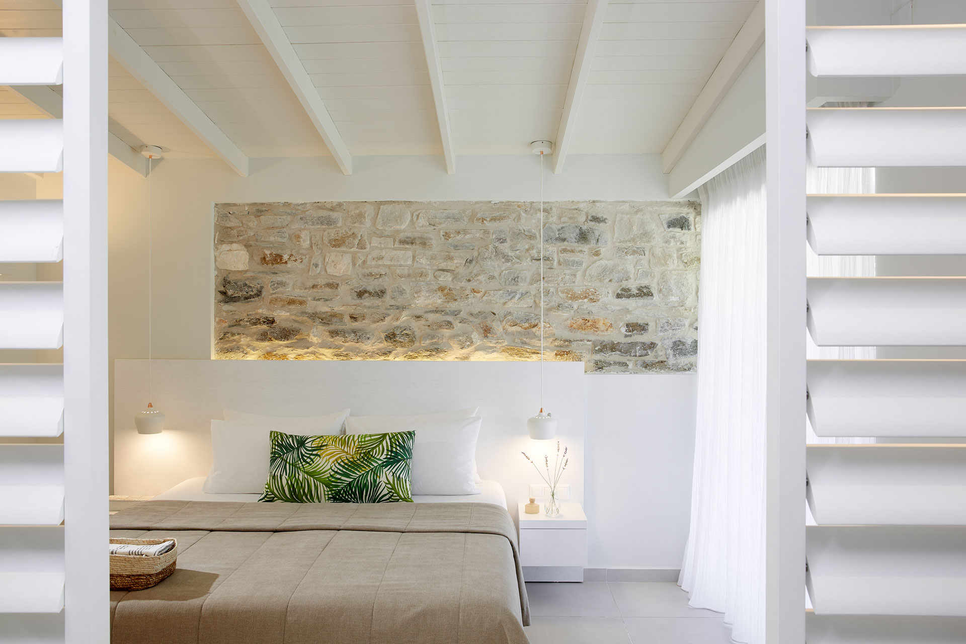 Makryammos Bungalows Hotel Superior Junior Suite sleeping area.jpg