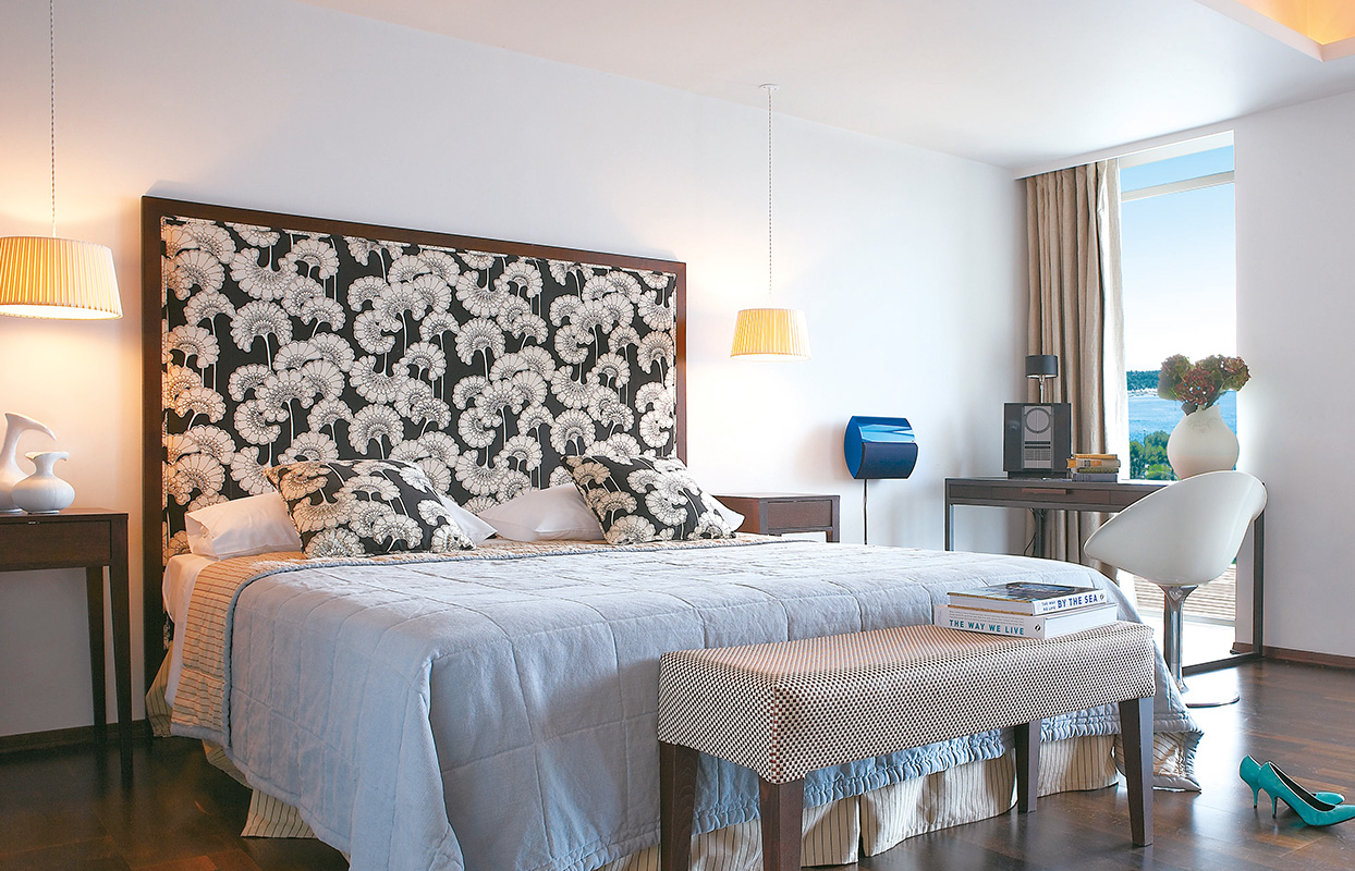 Vouliagmeni Suites premium deluxe guestroom.jpg
