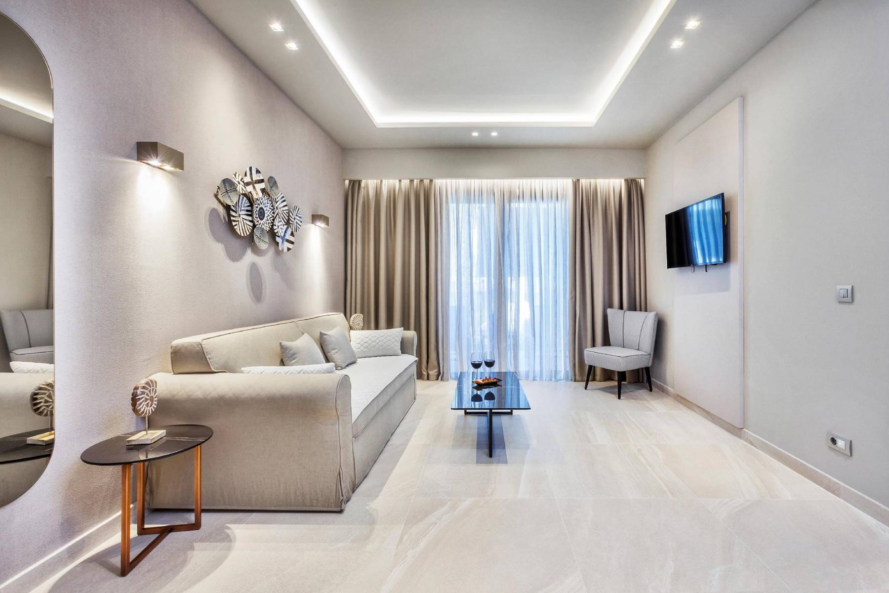 Hotel Pefki Deluxe Residence dnevna soba.jpg