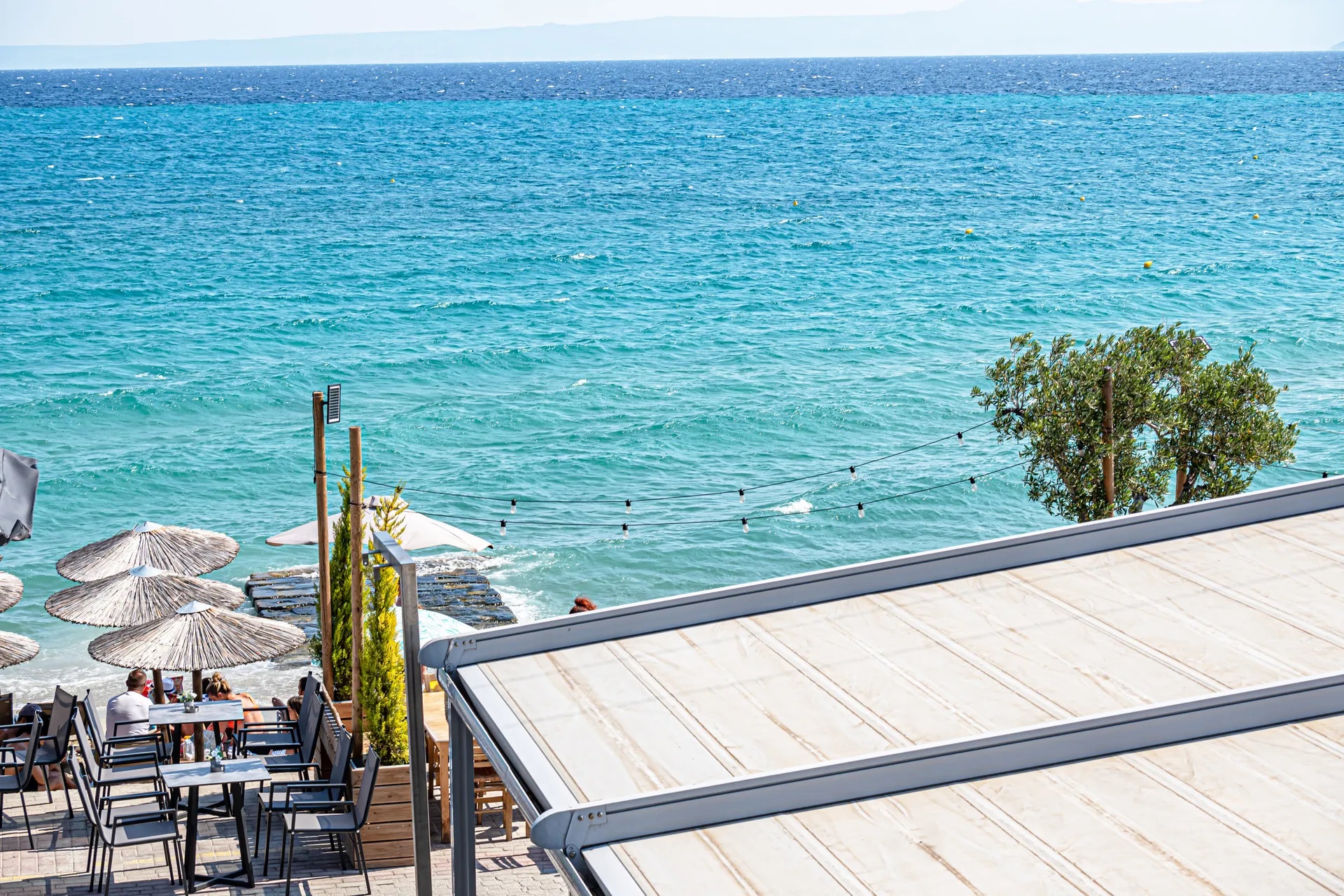 Kima Premium Apartments-Bar pored plaze.jpg