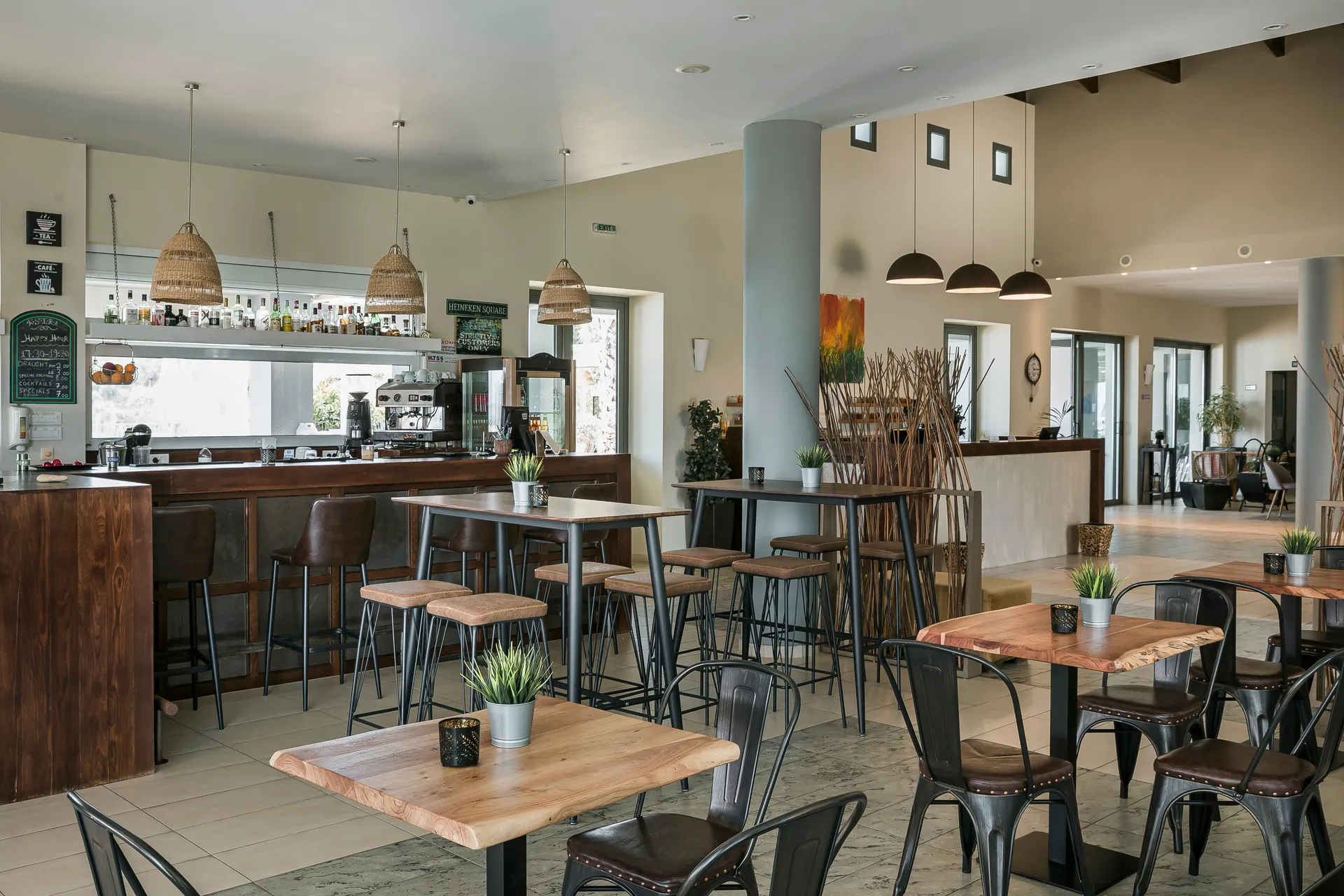 Astra Village Hotel & Suites bar.jpg