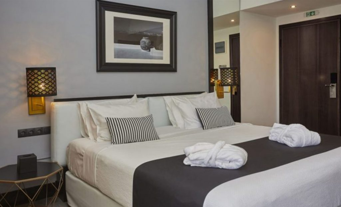 Athenian Riviera Hotel & Suites spavaća soba