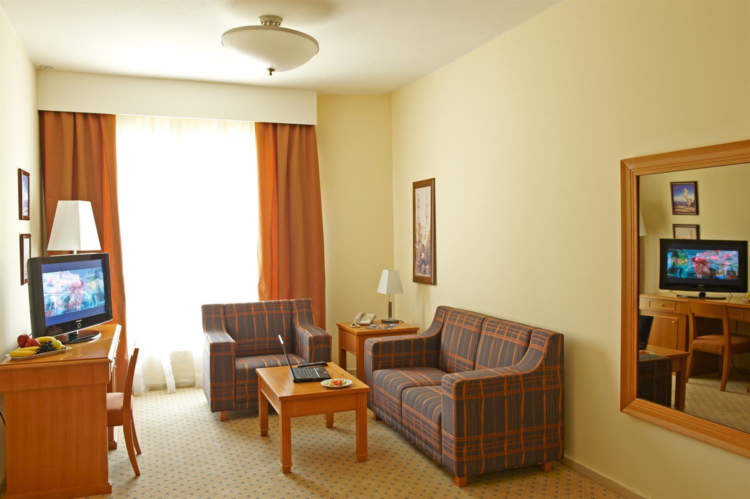 Golden Tulip Sharjah Hotel Apartments-Suite.jpg
