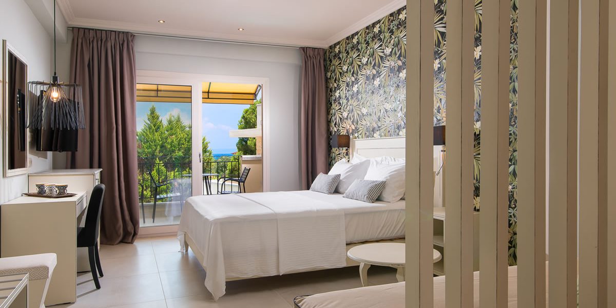 Hotel Neikos Mediterraneo deluxe triple room.jpg