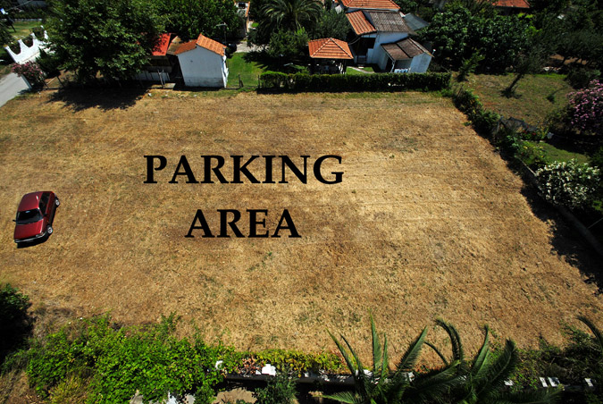 Hotel Olympion Melathron parking.jpg