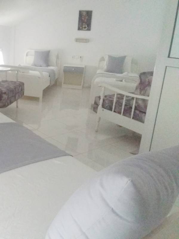 Pegasus hotel five beds room.jpg