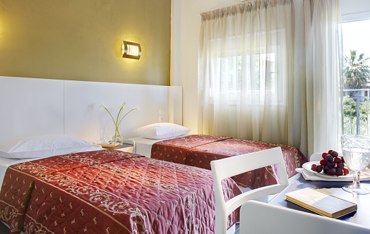 Hotel Alkyonis triple room garden view.png