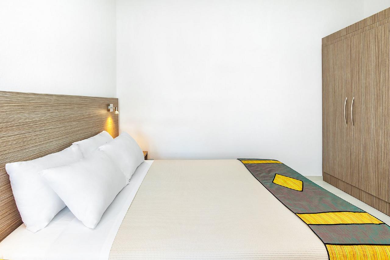 Hotel Xenios Dolphin Beach family room one bedroom 2.jpg