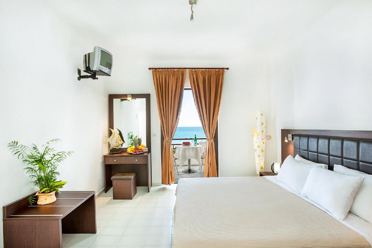 Xenios Dolphin Beach hotel standard room sea view.jpg