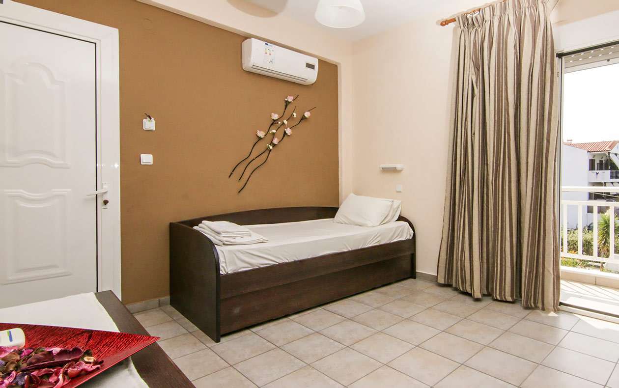 Sunset hotel - Suite - krevet.jpg
