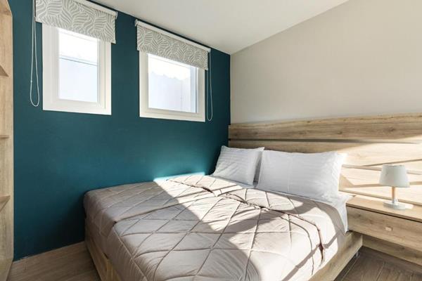 Hotelo Sunshine Apartments - pogled na ležajeve.jpg